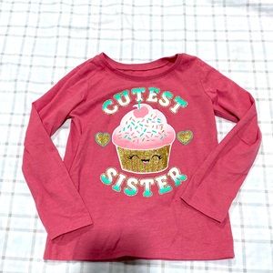 The children place shirt